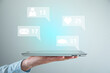 © ARAMYAN - man holding tablet with social network icons