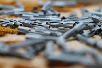 Canvas Print - Scattered gray dowels on the carpet.