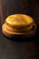 Wall Mural - Delicious fresh baked custard tart sprinkled with ground nutmeg