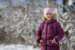 © Evgenia Tiplyashina - A child girl on a walk in a winter park