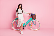 Full Length Body Size Photo Of Pretty Girl Standing With Blue Bicycle On Holidays Isolated On Pastel Pink Color Background