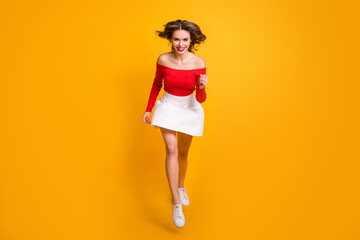 Poster - full length body size photo running fast hurrying up girl smiling in stylish clothes isolated on viv