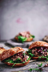 FIVE SPICE PULLED DUCK BUN WITH PLUM SAUCE