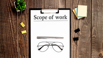 Poster - Scope of work text form on wooden table with office tips