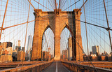Fototapeta Mosty linowy / wiszący - Brooklyn Bridge at sunrise, New York City , Manhattan