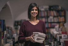 Portrait Of Beautiful Woman Bookshop Owner. Successful Independent Businesswoman, Owner Of A Book Shop