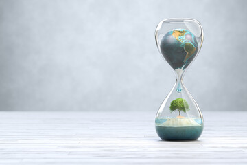 earth planet in hourglass, global warming concept.