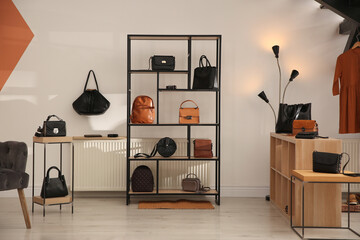 Wall Mural - Collection of stylish women's bags and accessories in luxury boutique