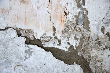 texture of old wall with cracked plaster for background