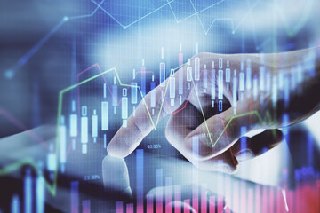 Multi exposure of man's hands holding and using a digital phone and forex graph drawing. Financial market concept.