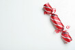 Red Christmas cracker on white background, top view. Space for text