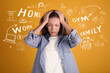 © New Africa - Stressed young woman, text and drawings on yellow background