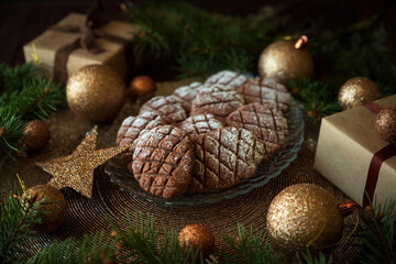 Wall Mural - Christmas gingerbread cone cookies with Christmas decorations. New Year and Christmas celebration concept. Soft focus