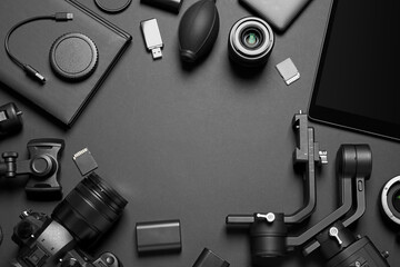 Aufkleber - Camera and video production equipment on black background, flat lay. Space for text