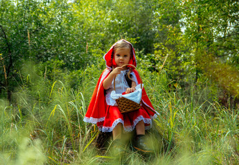 Wall Mural - girl in the forest in red clothes, Little Red Riding Hood, summer, green, park, young, tree, grass, beautiful,   cosplay, path, path, trees, spring, heat, basket, book, wolf