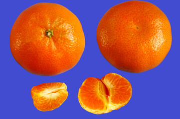 Tangerines isolated on a blue background