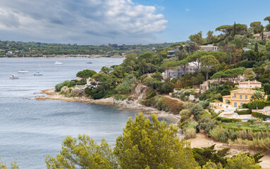 Sticker - Picturesque coastline of French Riviera and green landscape with luxurious villas and yachts in Saint Tropez, Cote d'Azur, Southern France.