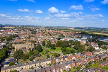 Aerial photo of the British town of Ossett, a market town within the metropolitan district of the City of Wakefield, West Yorkshire, England showing a typical UK housing estate