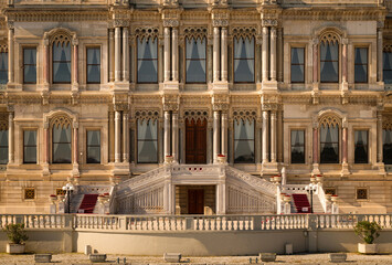 View from the waters of Bosporus Strait on the main building of glamorous Ciragan Palace, a historic ornate Ottoman sultan palace in Besiktas district of Istanbul