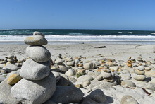 Stacked Rocks On A Beach Along The 17 Mile Drive In Monterey, California.