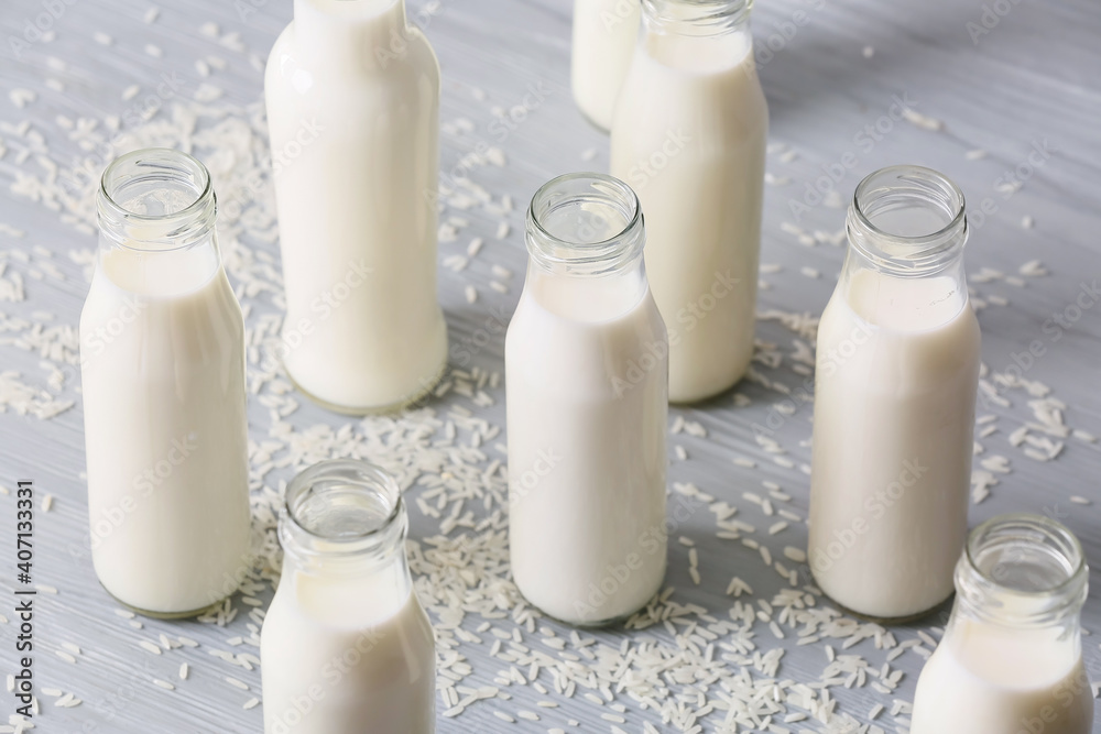 Bottles of rice milk on table