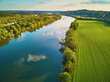 Scenic aerial view of the Seine river and green fields in French countryside