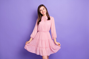 Poster - Portrait of nice pretty cheerful girl wearing pink dress posing isolated over bright violet color background