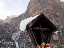 A Wayside Cross With Jesus Christ In Winter