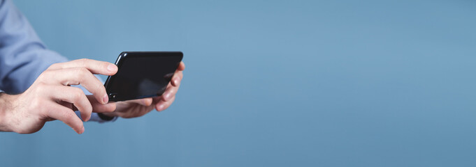 Man taking a picture with smartphone.
