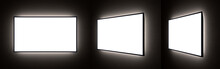 Set Of Different Viewing Angles Of Blank TV Or Ad Screens With Backlight In The Dark On The Wall. 3D Rendering Of LCD Or LED Flat Panel Monitors.
