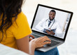 © Prostock-studio - Ehealth. Unrecognizable woman having online video conference with doctor on webcam, using laptop to chat with GP