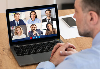 Aufkleber - Businessman Talking With Employees Via Online Video Call In Office