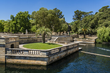 Canvas Print - Remarkable garden and first public garden in Europe: Nimes Gardens of the Fountain (Jardin de la Fontaine, 1738 - 1755). Nimes, Occitanie region of southern France.