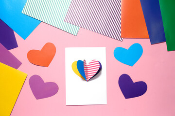 Step by step instruction. Making of a greeting card with colored paper hearts for Valentine's day. DIY concept. step 5