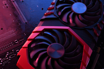 Poster - Computer game graphics card, videocard with two coolers on circuit board ,motherboard background. Close-up. With red-blue lighting