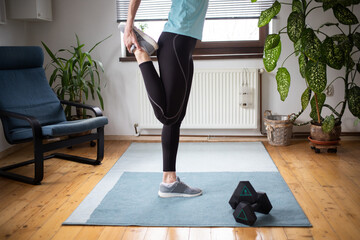 woman doing exercise at home