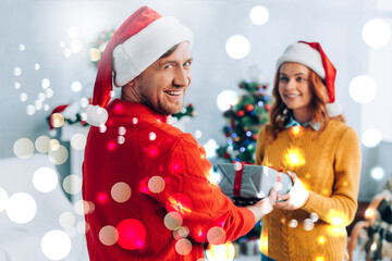 Cropped view of happy couple celebrate Christmas holidays, banner