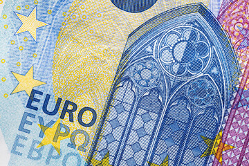 CLOSE UP OF EURO BANKNOTE. ECONOMY, FINANCES AND BUSINESS CONCEPT.