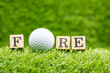 Golf with word FORE is on green grass background