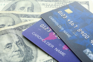 Wall Mural - Credit cards with dollar banknotes, closeup