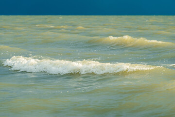 Wall Mural - sea and blue dramatic sky. tide at sea during blue twilight in cloudy weather