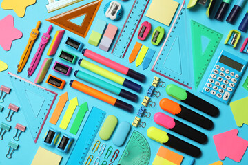 Sticker - Different stationery on light blue background, flat lay. Back to school