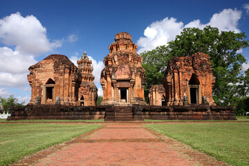 Prasat Sikhoraphum or Castle Rock temple in Surin of Thailand, with beautiful blue sky and clouds background. 