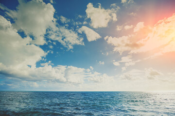 Fototapete - Seascape on a sunny day. The sea with a beautiful cloudy sky. Open sea on a sunny day