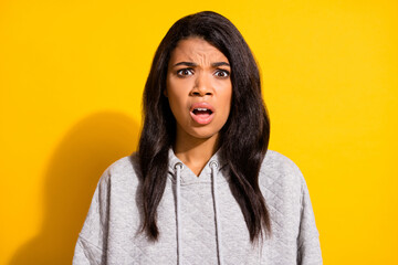 Poster - photo of upset impressed dark skin girl dressed grey sweatshirt open mouth big eyes isolated yellow 