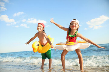 Sticker - Cute children enjoying sunny day at beach. Summer camp