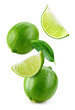 Lime fruit isolate. Lime whole, half, slice, leaf on white. Falling lime slices with leaves. Flying fruit. Full depth of field..