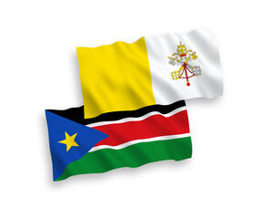 National vector fabric wave flags of Vatican and Republic of South Sudan isolated on white background. 1 to 2 proportion.