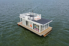A Houseboat On A Lake In The City, A Place Of Snouth And Entertainment.