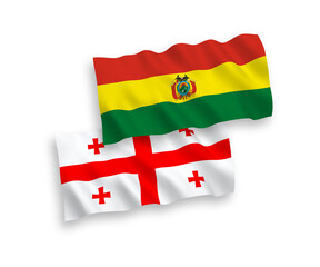 National vector fabric wave flags of Bolivia and Georgia isolated on white background. 1 to 2 proportion.